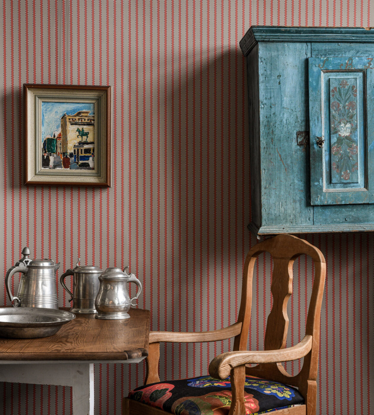 With inspiration from hand tacked textiles the ’stitches’ gives an edge to the stripes in this wallpaper design.