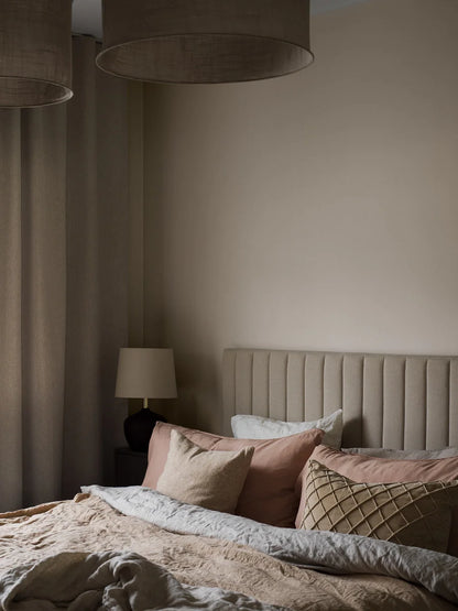 Envelop your room in the comforting embrace of our Kim wallpaper in warm beige hues.