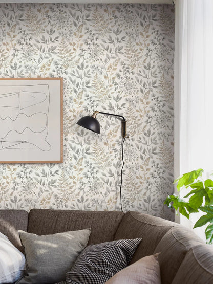 Bringing to mind the coziness of autumn, our Sigrid wallpaper in grey and golden-brown tones on a white background is bold and beautiful