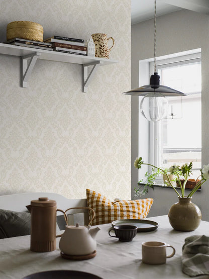  Colored in a soft grey and beige with accents of gold, our Ottilia wallpaper adds a touch of luxury and interest to chic and stylish interiors. 