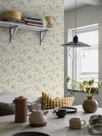 Bring life and color to your space with our Vilma wallpaper in a mild and natural color scheme of rich yet muted brown, golden ochre and luscious green.