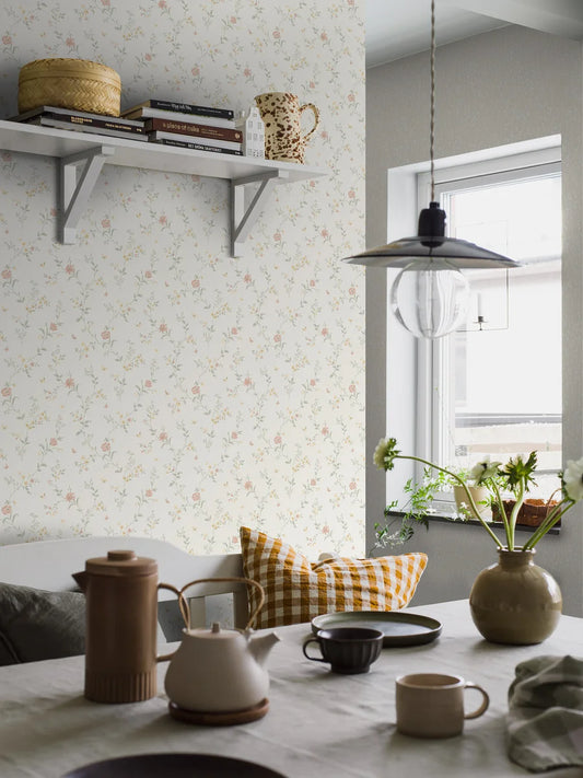 Shabby chic blends with romantic charm in our Viktoria wallpaper colored in a pretty palette of white, green, yellow and pink.