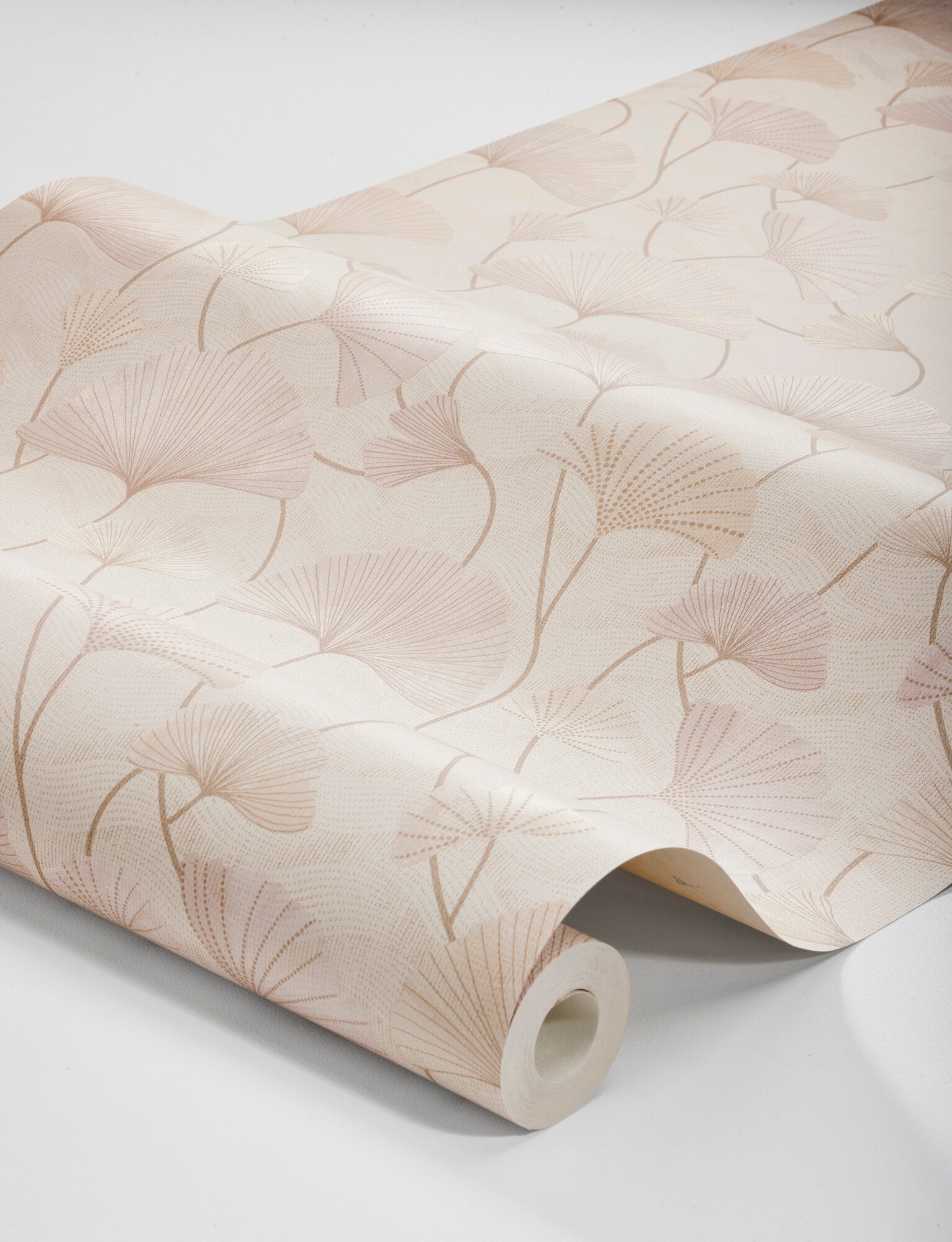 Colored in a luxurious and romantic palette of pink and apricot hues, our Sophia wallpaper is enhanced with hints of shimmering gold on a light background.