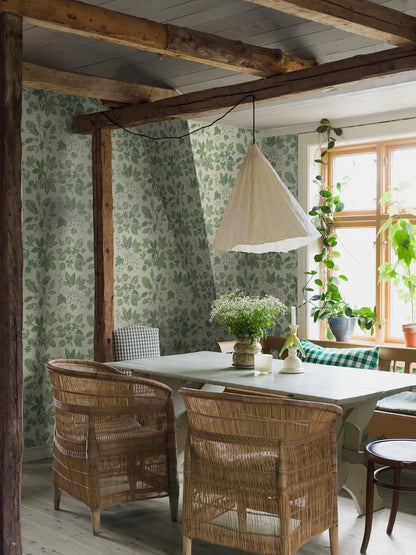 Set on a warm white background with fresh green and brown detailing, our Arboretum wallpaper in surface print is contemporary and playful.