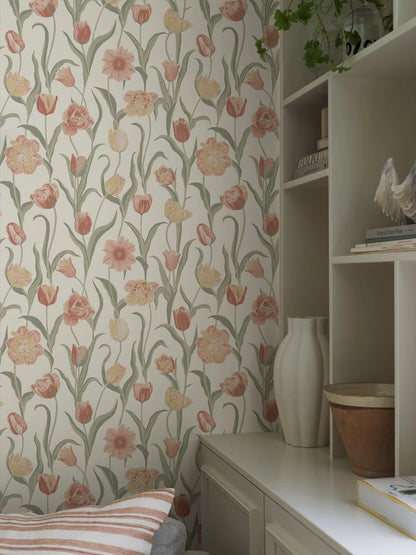 This joyful La Belle Epoque wallpaper is adorned with a variety of tulips in different colors, from pink and apricot tones with buttery yellow edges, to cream-yellow flowers.