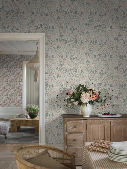  This delightful Trädgårdsfröjd wallpaper showcases apricot pink and white flowers with linden green leaves on a soft beige background. 