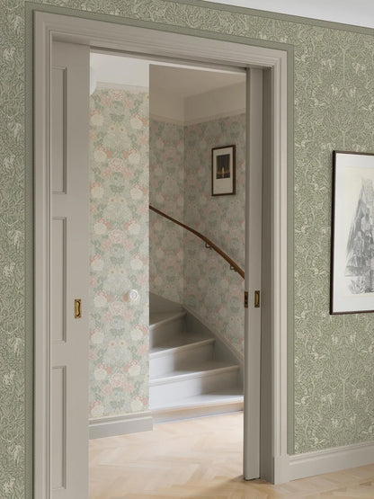 Enhance your home with our Kalles Bård wallpaper border in muted green and beige hues.