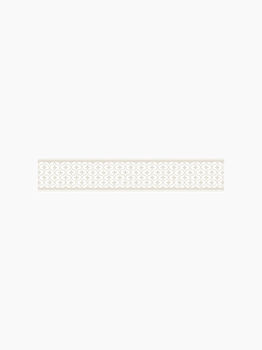  Featuring a dense yet subtle repeat geometric pattern, our Kalles Bård wallpaper border is colored in warm light beige tones and set on a fresh white background. 