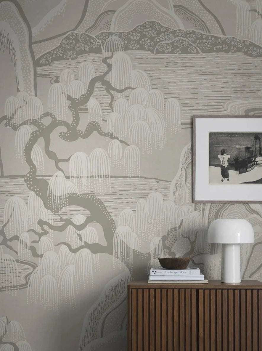 Across the light wallpaper Indigo Garden Mural stretches a magical landscape with Asian characteristics.