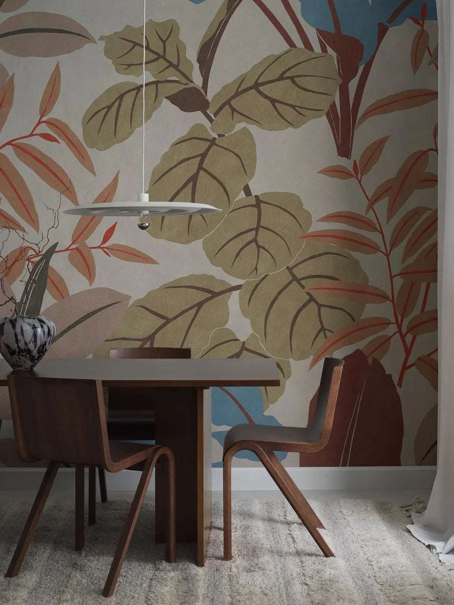 The Grand Leaves wallpaper is covered with large-scale, multicolored foliage – a bold, graphic pattern that makes you feel like you’re in the middle of a vibrant jungle.