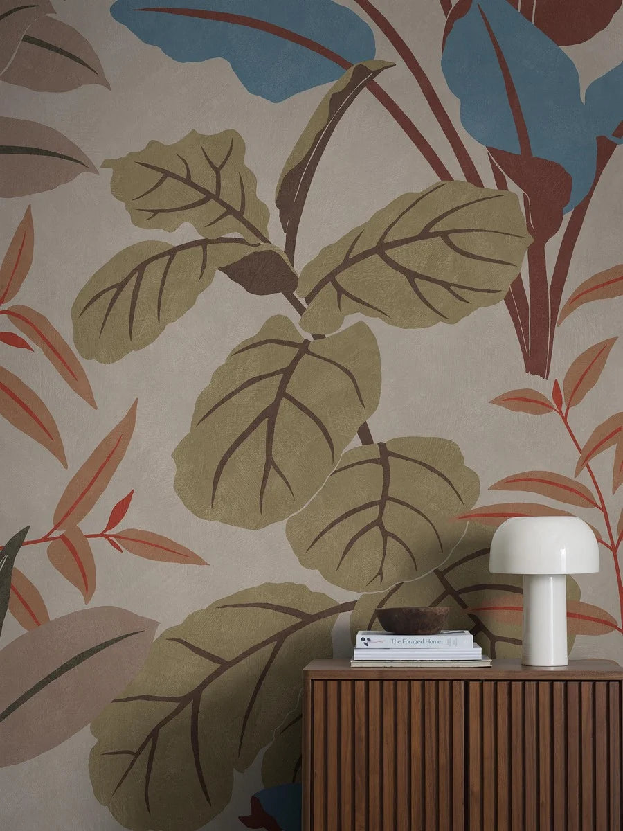 The Grand Leaves wallpaper is covered with large-scale, multicolored foliage – a bold, graphic pattern that makes you feel like you’re in the middle of a vibrant jungle.