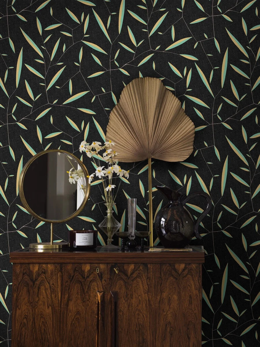 Designed by Dagobert Peche, this Daphne wallpaper features stylized laurel leaves and takes inspiration from the Greek mythological nymph of the same name. 