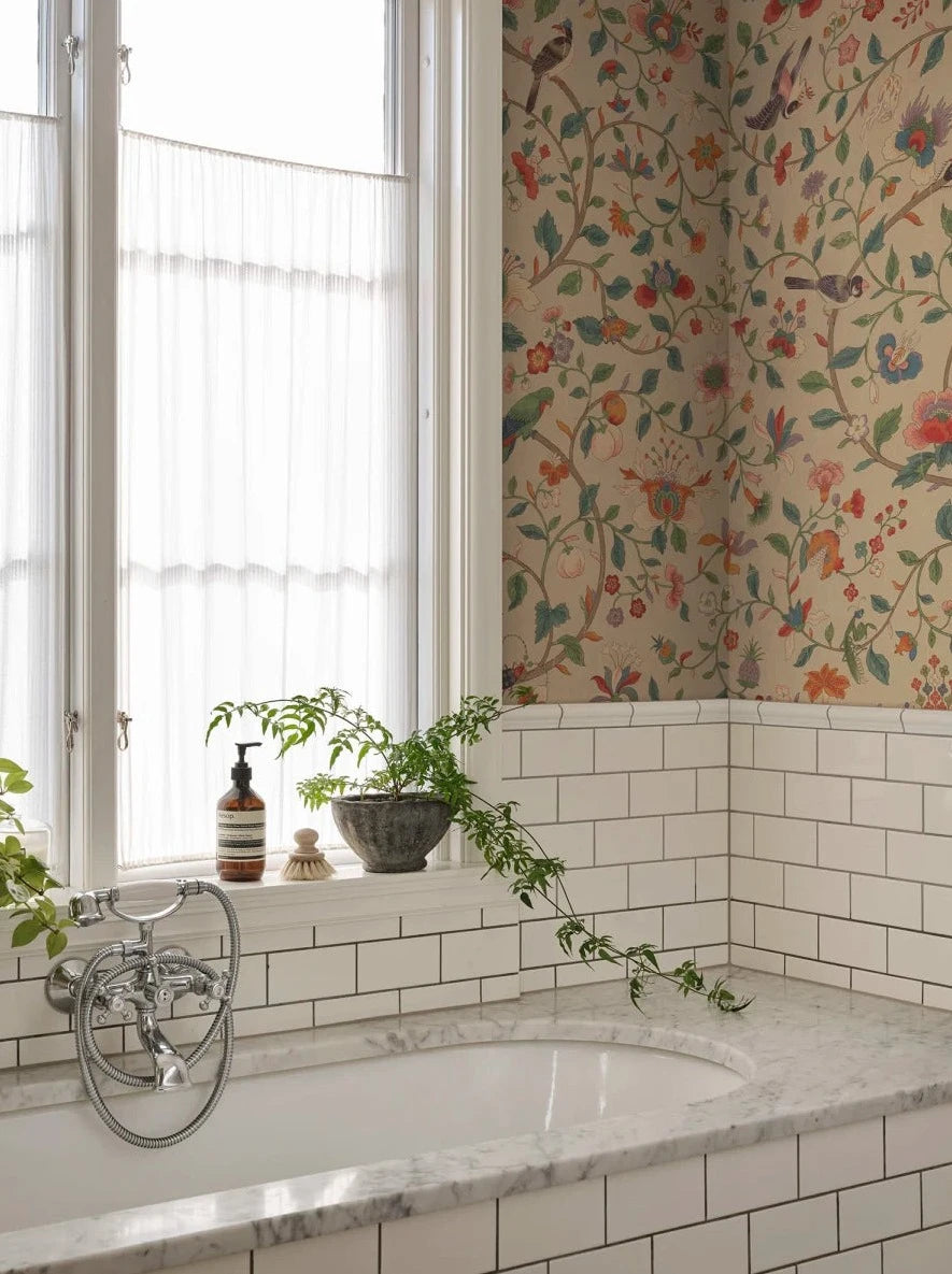 Hedda wallpaper has an exquisitely detailed older hand-painted original, which, with its multifaceted colors, can match many different interiors. 